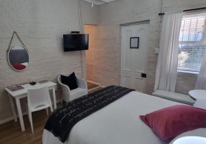 Postel nebo postele na pokoji v ubytování Rietjiesbos Self Catering