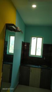 Kuchyň nebo kuchyňský kout v ubytování Ashirbad Guest House