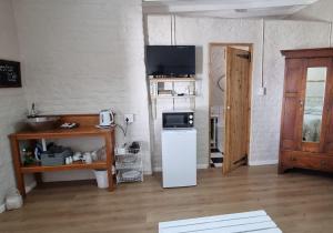Kuchyň nebo kuchyňský kout v ubytování Rietjiesbos Self Catering
