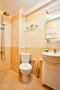 a bathroom with a toilet and a sink at ❀ AURORA-AN OASIS IN VIBRANT DOWNTOWN! ❀ A/C, LIFT in Sofia