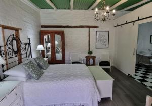 Postel nebo postele na pokoji v ubytování Rietjiesbos Self Catering