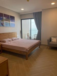 Giường trong phòng chung tại ARIA RESORT-2&3BEDS Apartment,hồ bơi và bãi biển miễn phí,50m
