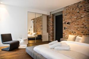 Postel nebo postele na pokoji v ubytování Hotel Nicolaus + 37 fotografií