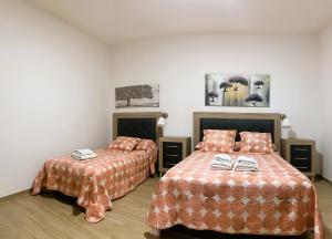 Postel nebo postele na pokoji v ubytování Apartamento La Cueva, Artenara + 13 fotografií