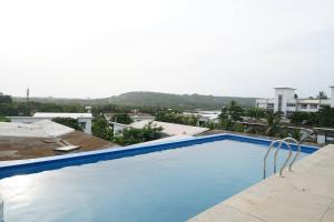Bazén v ubytování Iris by Le Pension Stays nebo v jeho okolí