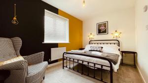 a bedroom with a bed with stars on the wall at She's Electric in Blandford Forum
