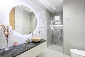 Kúpeľňa v ubytovaní Balticus Apartamenty Deluxe Promenada Gwiazd 14 + 37 fotografií