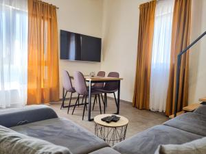 Μια τηλεόραση ή/και κέντρο ψυχαγωγίας στο Vale Mare Apartment
