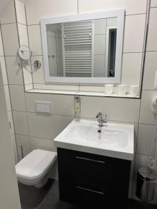 Koupelna v ubytování Garni Hotel Eastside
