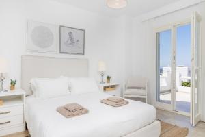 Postel nebo postele na pokoji v ubytování Naxian Resort + 197 fotografií