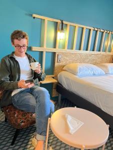 Postel nebo postele na pokoji v ubytování Birgit Hôtel Le Havre Centre