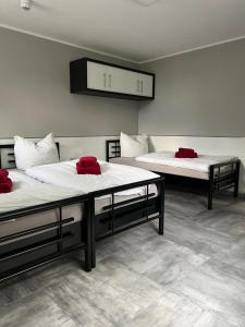 Postel nebo postele na pokoji v ubytování Garni Hotel Eastside