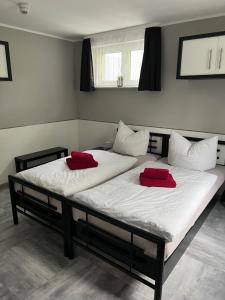 Postel nebo postele na pokoji v ubytování Garni Hotel Eastside