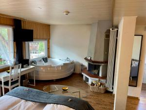 Voodi või voodid majutusasutuse Chalet Hotel Adler toas