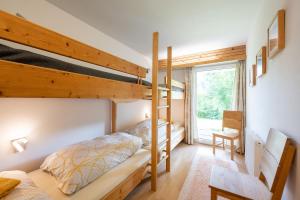 Postel nebo postele na pokoji v ubytování Birkenhof - Schimek