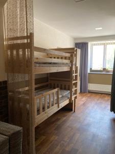 Postel nebo postele na pokoji v ubytování Apartman U Mostu