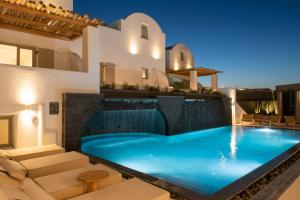 a swimming pool in the middle of a house at AVAL All Suite in Mesaria