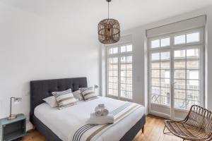 Posteľ alebo postele v izbe v ubytovaní L'ILE AUX MOUETTES - en plein Intra-Muros + 6 fotografií