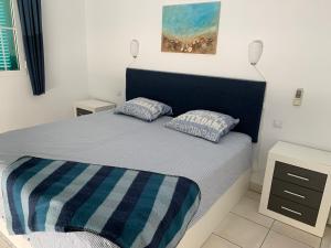 Postel nebo postele na pokoji v ubytování La Casita de la Playa 24-38