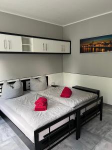 Postel nebo postele na pokoji v ubytování Garni Hotel Eastside