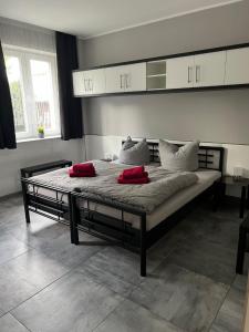 Postel nebo postele na pokoji v ubytování Garni Hotel Eastside