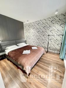 A bed or beds in a room at Vip Apartmens Cіti , апартаменти у НОВОБУДОВІ, ТЦ Майдан, ТЦ Проспект, Медичний центр БазисМед!