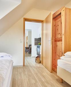 Postel nebo postele na pokoji v ubytování Pamir - 27