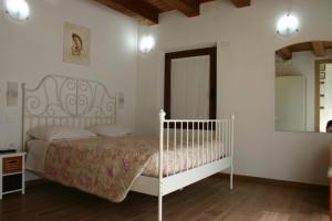 Posteľ alebo postele v izbe v ubytovaní A casa di Giò