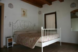 Posteľ alebo postele v izbe v ubytovaní A casa di Giò