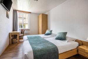 Hotel Rheingerbe客房内的一张或多张床位