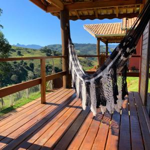 Balkon atau teras di Chalés Água azul