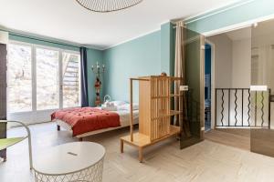 Posteľ alebo postele v izbe v ubytovaní LA MARONAISE - Maison dans la calanque