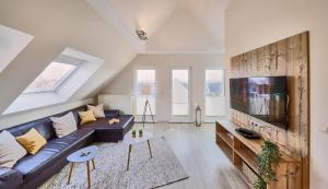 TV a/nebo společenská místnost v ubytování Pamir - 29