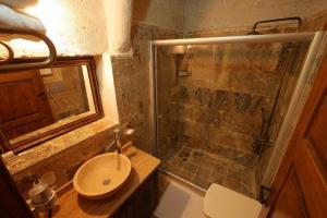A bathroom at Avanos Suites