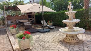 Zahrada ubytování Apartments Kivi