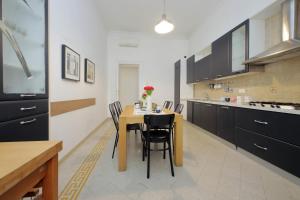 מטבח או מטבחון ב-Luxury Spagna Apartments