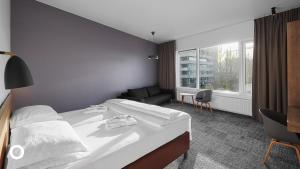 Postel nebo postele na pokoji v ubytování Midgardur by Center Hotels
