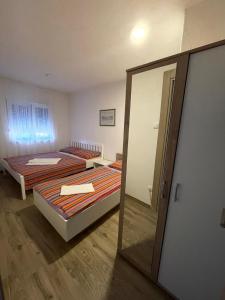 Posteľ alebo postele v izbe v ubytovaní Villa Ivan