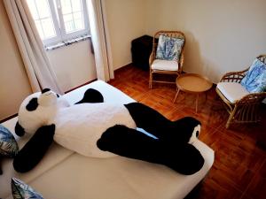 Ein Bett oder Betten in einem Zimmer der Unterkunft Blue Bamboo Hotel - Duna Parque Resorts & Hotels