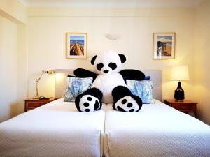 Ein Bett oder Betten in einem Zimmer der Unterkunft Blue Bamboo Hotel - Duna Parque Resorts & Hotels