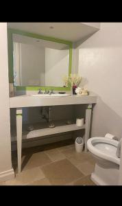 a bathroom with a sink and a toilet at Villa Francesca in Capri