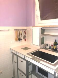 a kitchen with a sink and a counter top at chez Chany in Merano +15 photos