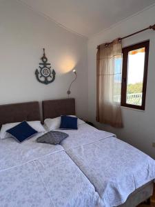 Łóżko lub łóżka w pokoju w obiekcie Apartments Valentinovo