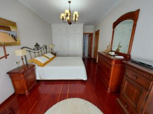 Postel nebo postele na pokoji v ubytování Precioso apartamento en O Grove