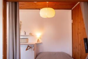 Posteľ alebo postele v izbe v ubytovaní Studio cocon sous les toits de Jaurès
