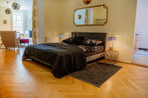 Posteľ alebo postele v izbe v ubytovaní Astoria city deluxe