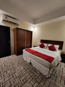 Posteľ alebo postele v izbe v ubytovaní بيت السائح Tourist Home