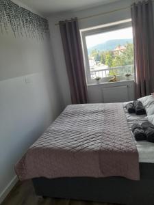 Posteľ alebo postele v izbe v ubytovaní Gawra Gustawa