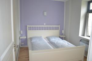 Postel nebo postele na pokoji v ubytování Wassersportzentrum Alte Feuerwache