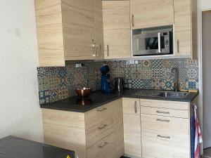 مطبخ أو مطبخ صغير في Appartement Villard-de-Lans, 2 pièces, 5 personnes - FR-1-515-132